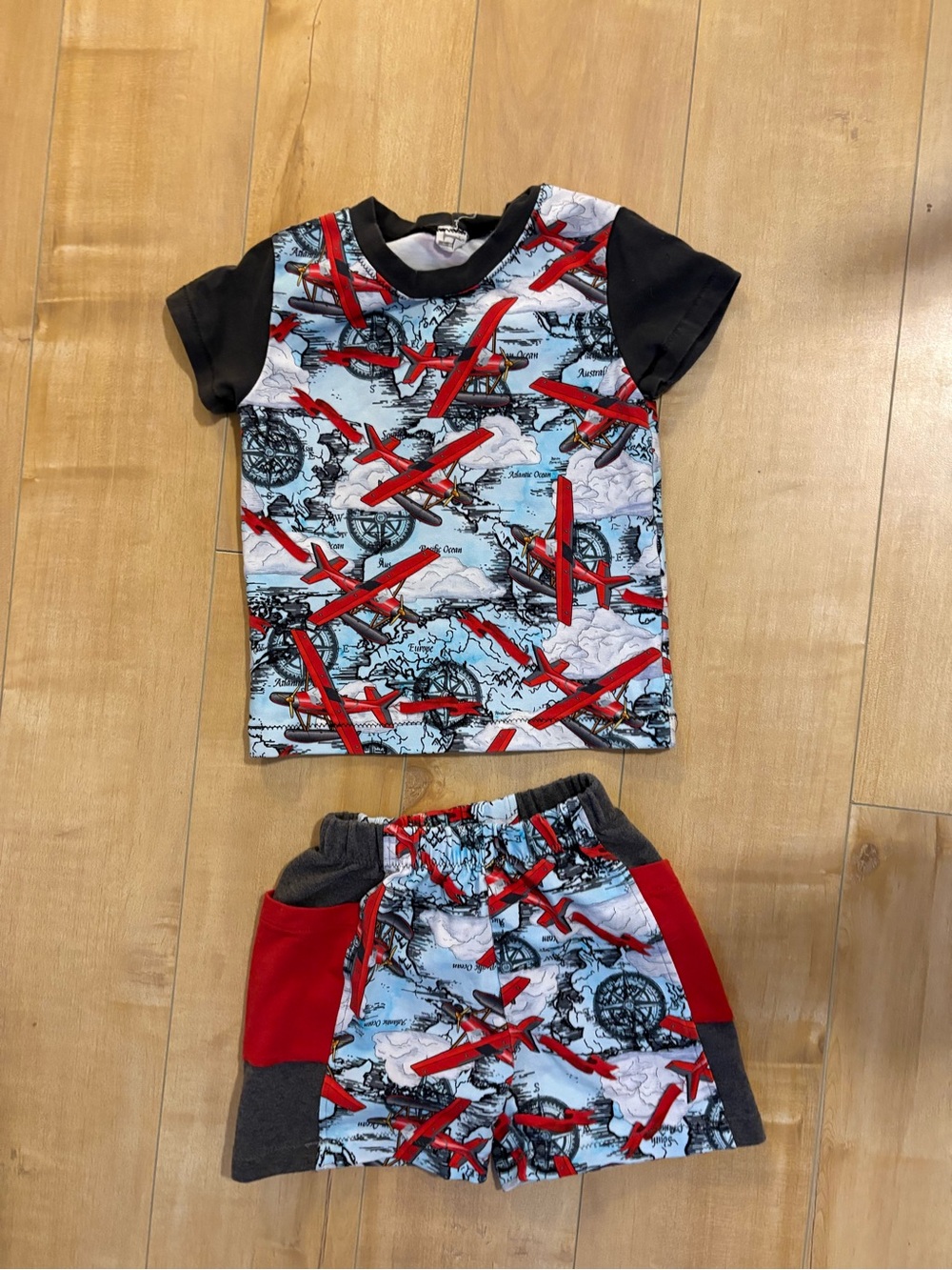 Kids Red Airplane Print Swim Set - Short Sleeve Rash Guard and Shorts